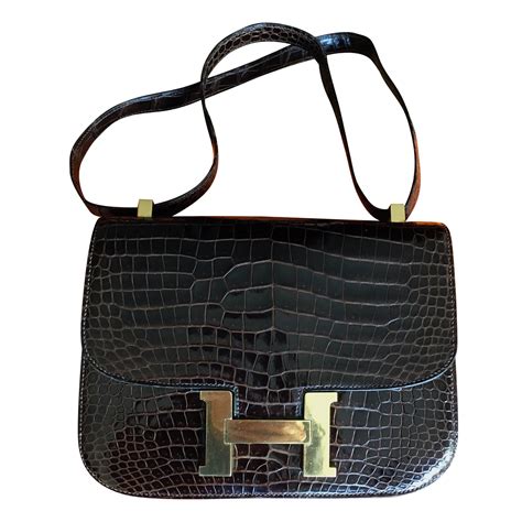 hermes constance crocodile.